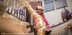 Dazzling indian bride walking down the stairs Dazzling indian bride walking down the stairs