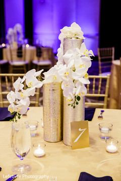 Elegant floral centerpiece. indian wedding reception,indian decor,floral centerpiece