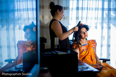 Indian bride getting her hair done Indian bride getting her hair done