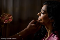 Lovely bride getting her makeup done Lovely bride getting her makeup done