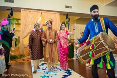 Indian groom making his entrance to wedding ceremony Indian groom making his entrance to wedding ceremony
