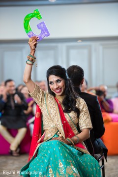 Indian bride and groom's sangeet night games pre- wedding celebrations,sangeet,indian bride and groom