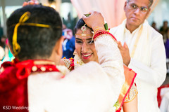 Indian bride and groom at their wedding ceremony indian wedding ceremony,indian bride and groom,indian wedding ceremony photography