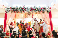 Indian bride and groom's saptapadi ritual indian wedding ceremony,indian bride and groom,indian wedding ceremony photography,saptapadi ritual