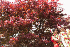 Indian bride and groom's romantic moment outdoor photography,indian bride and groom,indian wedding gallery