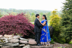 Enchanting indian bride and groom outdoor photography,indian bride reception fashion,indian groom suit