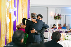 Indian bride and groom's emotional moment indian wedding reception,indian wedding reception photography,indian bride and groom