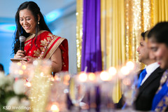 Lovely indian couple listening to bridesmaid's speech indian wedding reception,indian wedding reception photography,indian bride and groom,indian bridesmaids