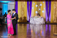 Charming indian groom dancing with her mother indian wedding reception,indian wedding reception photography,indian groom fashion
