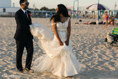 Indian couple by the beach indian bride and groom,outdoor photography,indian wedding gallery