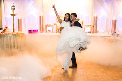 Joyful indian bride and groom's first dance indian wedding reception photography,indian bride and groom,indian wedding reception,dj and entertainment