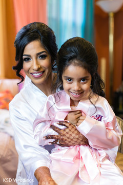 Indian bride and flower girl getting ready. Indian bride and flower girl getting ready.