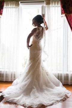Flawless Indian bride's white wedding dress. Flawless Indian bride's white wedding dress.