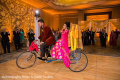 Indian bride and groom riding a rickshaw. indian wedding reception,indian bride and groom,rickshaw