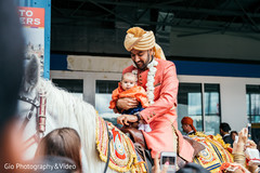 Indian groom riding horse to baraat baraat,horse,indian groom