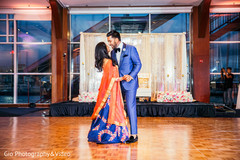 Indian newlyweds during their first dance first dance,indian newlyweds,indian wedding reception