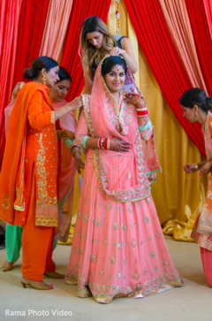 Gorgeous indian bride in pink lengha with gold and turquoise Gorgeous indian bride in pink lengha with gold and turquoise