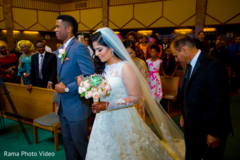 The new indian couple exiting their catholic ceremony The new indian couple exiting their catholic ceremony