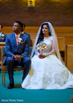 Lovely indian couple during catholic wedding ceremony Lovely indian couple during catholic wedding ceremony