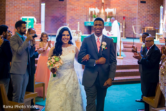 Joyful couple exiting their wedding ceremony Joyful couple exiting their wedding ceremony