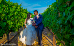 Lovely indian couple in a vineyard Lovely indian couple in a vineyard