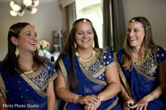 Indian bridesmaids in gold and blue. Indian bridesmaids in gold and blue.