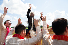 Indian groomsmen dancing during baraat Indian groomsmen dancing during baraat