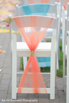 Indian wedding ceremony chairs wrapped in tulle Indian wedding ceremony chairs wrapped in tulle