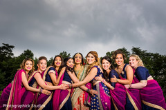 Delightful indian bride with bridesmaids blue sari,indian bridesmaids fashion,indian bride fashion
