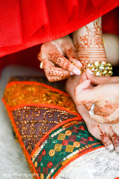 Indian bride putting anklets on Indian bride putting anklets on