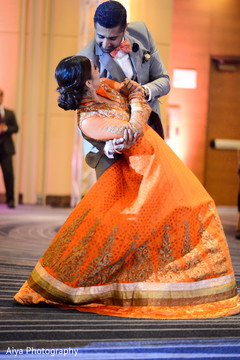 Indian bride and groom performing during wedding reception indian wedding reception,indian bride fashion,indian wedding reception photography
