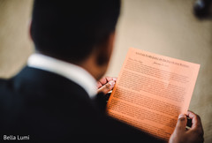 Indian groom reading his Maharani's letter indian groom,indian wedding photography