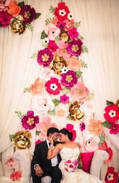Lovely indian couple at their wedding reception indian bride and groom,indian bridal bouquet,indian wedding decor