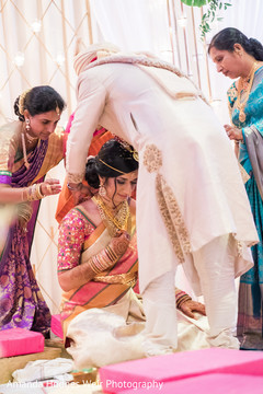 Indian groom giving the mangalsutra indian wedding,indian groom,mangalsutra