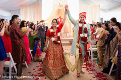 Indian newlyweds leaving wedding ceremony indian wedding ceremony,indian wedding ceremony photography,indian bride and groom