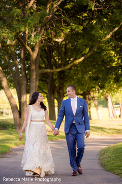 Sweet indian couple holding hands indian wedding gallery,outdoor photography,indian bride and groom