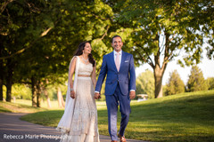 Take a look at this couple walking holding hands indian wedding gallery,outdoor photography,indian bride and groom