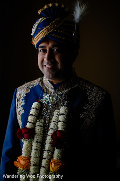 Indian groom in blue sherwani Indian groom in blue sherwani