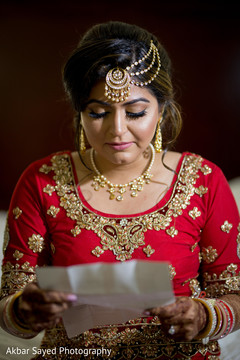 Beautiful indian bride reading letter from groom indian bride getting ready,indian bride fashion,bridal jewelry