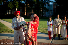 Indian bride and groom's joyful first look moment first look photography,indian groom fashion,indian bride fashion,indian bridal bouquet