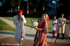 Indian bride and groom treasured moments first look photography,indian groom fashion,indian bride fashion,indian bridal bouquet