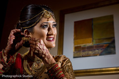 India bride getting ready. indian bride,getting ready,bridal jewelry