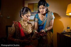 Indian bride placing of the bangles. indian bride,getting ready,bridal jewelry