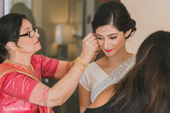 Fabulous Indian bride almost ready for her wedding day. indian bride,getting ready,hair and makeup