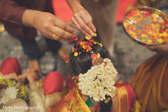 Indian bride showered with rose petals indian wedding ceremony,indian wedding ceremony photography,indian bride