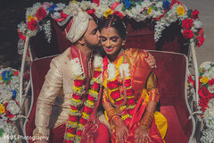 Cute indian couple leaving wedding ceremony venue indian wedding ceremony,indian wedding ceremony photography,indian bride and groom