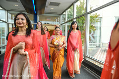 Sweet indian bride walking with bridesmaids indian bride fashion,indian bridesmaids fashion,indian wedding gallery