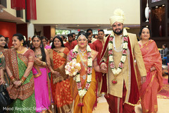 Sweet indian couple leaving wedding ceremony Sweet indian couple leaving wedding ceremony