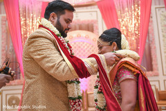 Indian bride and groom's jai mala ritual Indian bride and groom's jai mala ritual