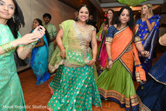 Sweet indian bride dancing pre- wedding celebrations,pre-wedding ceremony photography,indian bride fashion